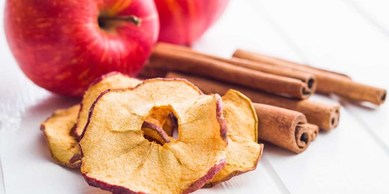 Dried apple slices and cinnamon.