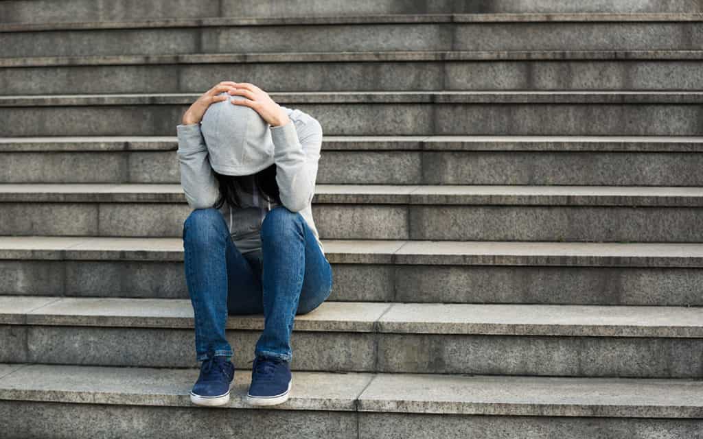 Upset woman with Fibromyalgia