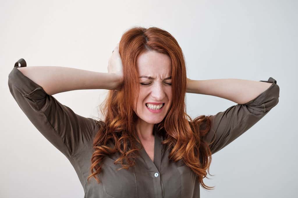 Woman Silencing her Inner Critic